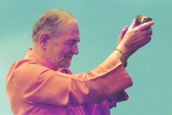 Swami Kriyananda Performing an Aarthi