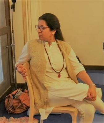 Jyoti doing Chair Yoga